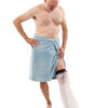 Man in a blue towel looking at his left leg wearing a LimbO Waterproof Protector