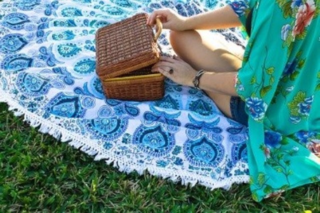 Woman on a picnic blanket