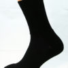 A black wool Prosox Ankle Length Sock that has been placed on a mannequin leg to demonstrate the appearance when worn on an actual leg