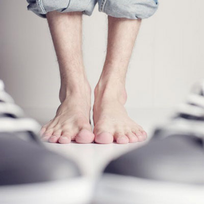 close-up-of-feet-standing-on-floor